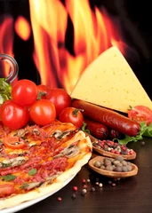 Foto op Plexiglas delicious pizza, salami, tomatoes and spices © Africa Studio
