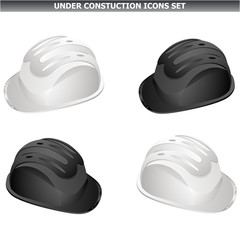 Black and white safety plastic hard hat.