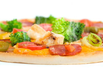 Close-up of fresh pizza with chicken and broccoli