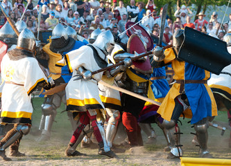 Medieval knights in battle - obrazy, fototapety, plakaty