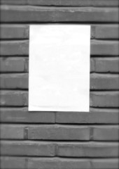 vintage look white empty street poster on brick wall