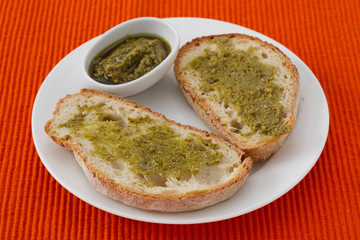 bread with pesto on the plate