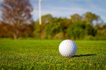 Golf ball on beautiful golf course