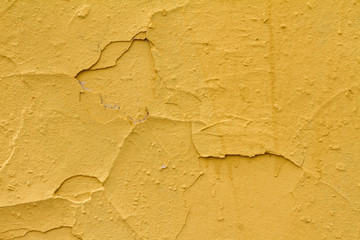 Piece of yellow wall useful for a background