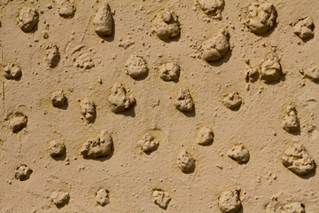 Wall with bulging pattern useful as a background