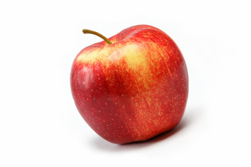 Ripe juicy natural red apple on a white background.