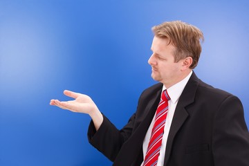Business man holding imaginary object