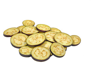 slices of eggplant fruit piled on white background