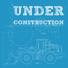 Vector under construction on a blueprint paper with bulldozer © Alex Ciopata