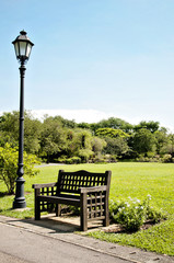 Streetlight, the bench and the garden