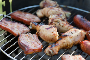 barbecue with delicious grilled meat on grill