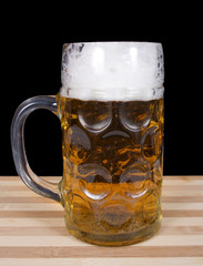 Glass with beer and foam