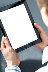 man holding a touchpad