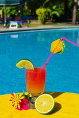 Tropical cocktail near swimming pool