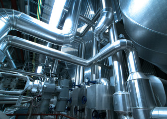 Equipment, cables and piping as found inside of  industrial powe