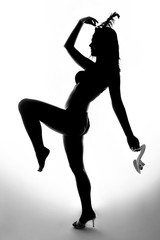 Silhouette of beautiful dancer in crazy pose