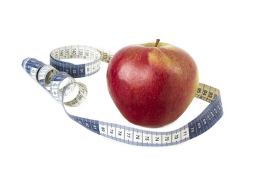 red apple,  measure tape isolated on white