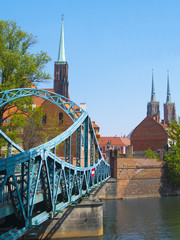 Obraz premium Lovers bridge and cathedrals in Wroclaw, Poland