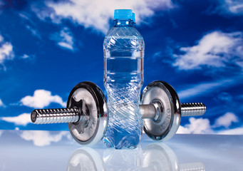 Obraz premium fitness dumbbells and water