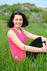 beautiful girl on a green meadow