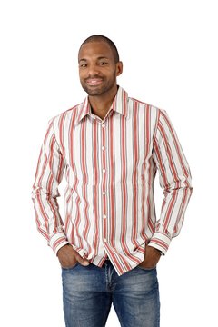 Happy ethnic guy in striped shirt
