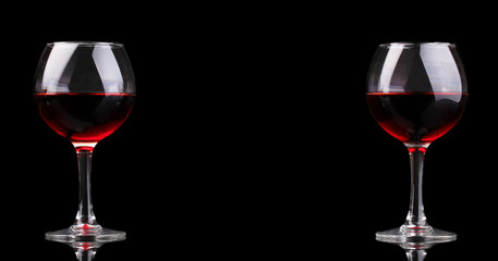 Wineglasses isolated on black