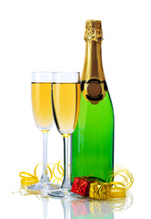 glasses and bottle of champagne, gifts and serpentine isolated