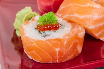 Japanese sushi traditional japanese food.Roll made of salmon, re