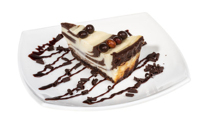 cheesecake with chocolate sauce.