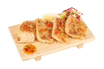 Fried fish fillets with  salad.
