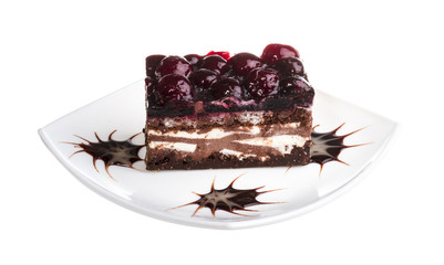 Chocolate cake with cherry on top on a white background