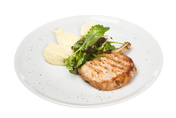 Grilled pork with salad and potato