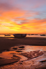 Fototapeta na wymiar sunrise with fishing boats