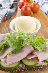 slice poppy seed bread with ham