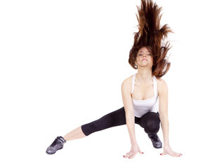 Obraz premium A young woman is stretching her body.