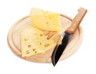 Cheese on cutting board with knife isolated on white