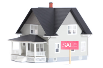 House architectural model with sale sign, isolated