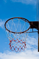 basketball hoop against blue sky