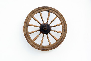 Vintage Spinning Wheel on White Wall