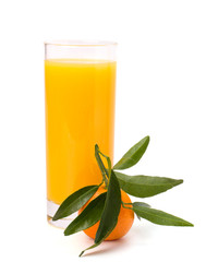 Tangerines and juice glass