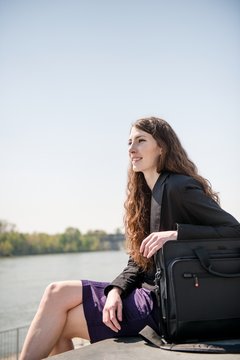 Business woman portrait - relaxing in nature