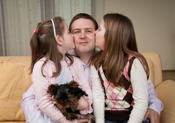 Love - children kissing father