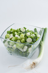 Spring onions, whole and sliced
