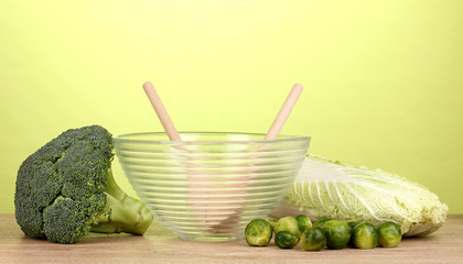 Glass bowl with cabbages and broccoli