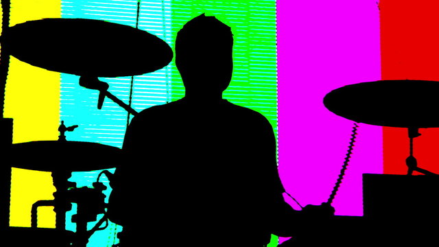 Silhouette of musician playing drums