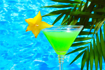 Glasses cocktail on blue sea background