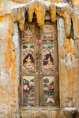 beautiful thai art painting on the old door of Thai temple