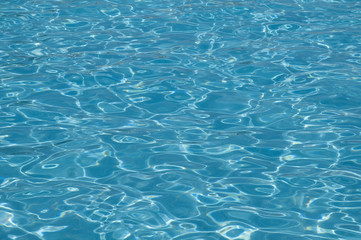Reflection of sun in pool water