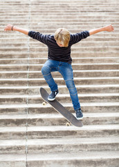 teen boy skateboarding on stairs © michaeljung