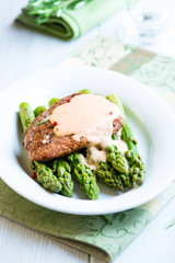 Beef Steak with Sauce on Green Asparagus